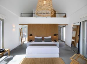 Superior Suite with Loft with Caldera View and Private Pool room in Melidonia Suites