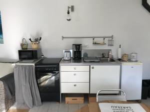 Appartements La petite Escarpolette : photos des chambres