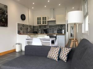 Appartements Appartement avec jardin : photos des chambres