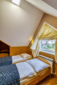 Pokoje Gościnne Grzybek