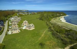 Strandhaus 6 "Düne" in Lobbe mit Meerblick, Kamin, Sauna