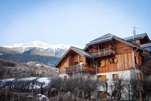 Hotels Residence Le Chalet de L'Eterlou by Popinns : photos des chambres