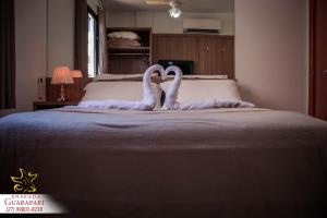 MAIOR NOTA - 2 Quartos com AR CONDICIONADOS SPLIT, Air Fryer, Wi-Fi, Disney Plus, Star Plus, HBO Max, Guarda Sol, Cadeiras de Praia, Caixa Térmica, Churrasqueira, Rede para Descanso e Chuveirão - 8 pessoas - CONFORTO Máximo - Melhor Localização!