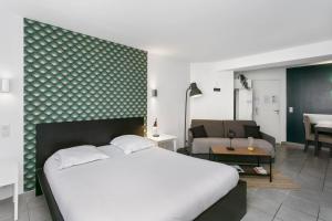 Appartements Coeur Urbain Apartments - Place de la Comedie : photos des chambres