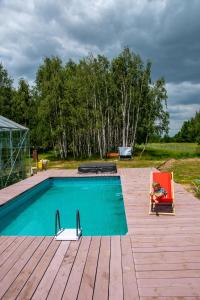 Nowa Wola 58 - 200qm appartment in a small village, with pool, sauna and big garden