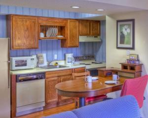 Two-Bedroom Suite with Two Queen Beds room in SureStay Studio by Best Western Charlotte Executive Park