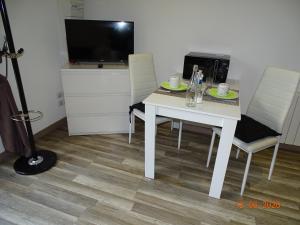 Appartements Legend- Parking prive Gratuit- Terrasse privee- Wifi - Convert - Alimentec : photos des chambres