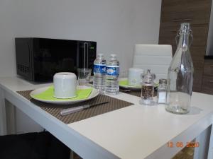 Appartements Legend- Parking prive Gratuit- Terrasse privee- Wifi - Convert - Alimentec : photos des chambres