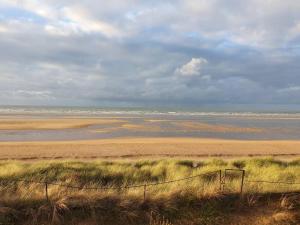 Appartements Beau Front de mer cosy acces direct plage St aubin sur mer : photos des chambres