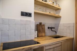 Appartements La garconniered’Uzes : photos des chambres