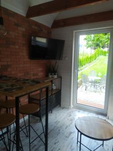 Lawendowo- sauna, jacuzzi, domki w ogrodzie i apartamenty w kamienicy