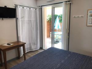 Hotels Hotel de la Plage : photos des chambres