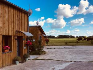 Maisons de vacances le chalet de la ferme du tertre : photos des chambres