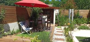 Appartements Secret Garden - Chez Gilles et Tra - Maison d hote -T2 super mignon, neuf et independant , dans cadre agreable et zen : photos des chambres