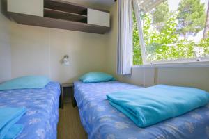 Campings Camping Taxo Les Pins : photos des chambres