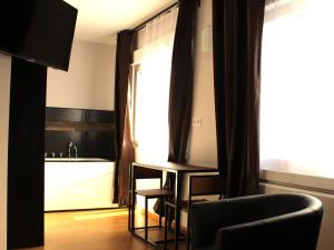 Appartements Appart Hotel Relax Spa : photos des chambres