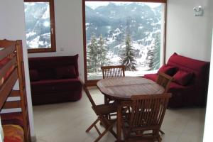Appartements Studio 33m2 vue panoramique sur le Grand Massif et Mt Blanc, plein sud : photos des chambres