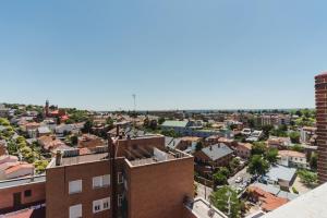 Cozy and Stylish Room with Natural Light and Vibrant Decor