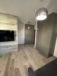 Apartament Drewno i Morze