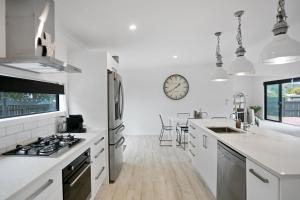Sky Above Beach Below - Waihi Beach Holiday Home