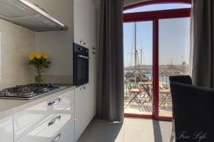 Mgarr Waterfront Cosy Apartment 3 by Ghajnsielem Gozo
