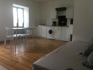 Appartements Le Papillon : photos des chambres