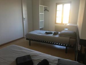 Appartements Le Papillon : photos des chambres