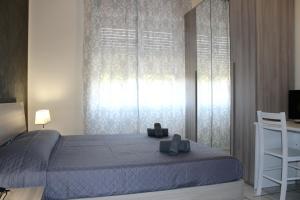 Double Room with Private External Bathroom room in Cagliari 4u Self Catering