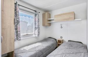 Campings Mobil Home 3 Chambres equipe : photos des chambres