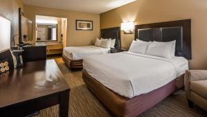 Queen Room with Two Queen Beds - Non-Smoking room in SureStay Plus Hotel by Best Western Jackson