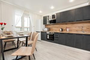One-Bedroom Apartment room in КВАРТИРНОЕ БЮРО Апартаменты Deluxe на Революционной 13а