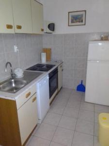 Two-Bedroom Apartment with Terrace room in Apartments by the sea Ivan Dolac Hvar - 18269
