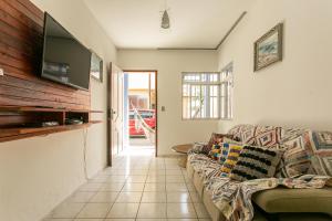 Casa 150m da praia em pátio familiar