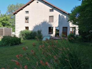 B&B / Chambres d'hotes Le Champ : Chambre Lits Jumeaux - Vue sur Jardin