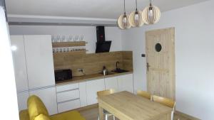 Apartamenty Gościniec Re-Max