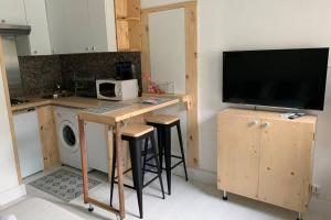 Appartements Charmant petit studio en centre ville : photos des chambres