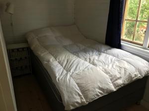 Stuga med havsutsikt i Sankt Anna