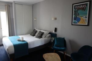 Hotels Un Hotel sur le Port : photos des chambres
