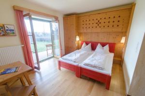 Superior Triple Room room in JUFA Hotel Tieschen - Bio Landerlebnis
