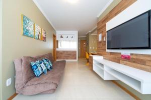 GRAMADO SOLAR REAL - 2 APTS de 2 quartos no mesmo prédio, cada um comporta até 7 pessoas - IDEAL PARA GRUPOS - central - IDEAL PARA ANDAR A PÉ, nesta plataforma desde janeiro de 2016, oferecemos CREDIBILIDADE - seu PET é bem-vindo - GARAGEM COBER