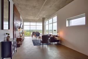 Gaze at Sprawling Green Vistas Through Walls of Windows