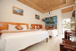 Phòng 3 Người Nhìn Ra Hồ Bơi (Triple Room with Pool View)