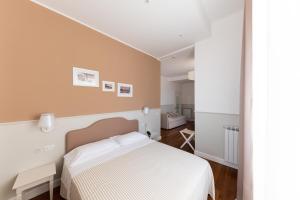 Quadruple Room with Partial Sea View room in Miramare Hotel