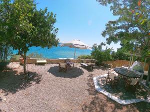 KIVERI 1876 traditional seafront cottage Arkadia Greece