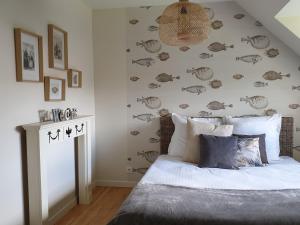 B&B / Chambres d'hotes Entre terre et mer : photos des chambres
