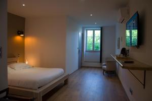 Hotels Aux Platanes : photos des chambres