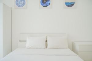 Spacious and Elegant 2BR M-Town Serpong Apartment By Travelio