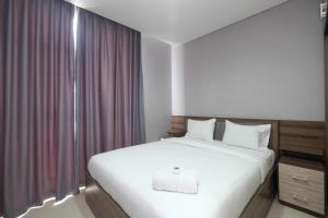 Spacious 2BR at Ciputra International Apartment By Travelio