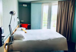 Hotels ibis Strasbourg Aeroport Le Zenith : photos des chambres