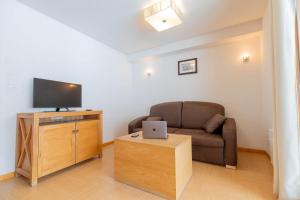 Appart'hotels Madame Vacances Residence Le Parc Des Airelles : photos des chambres